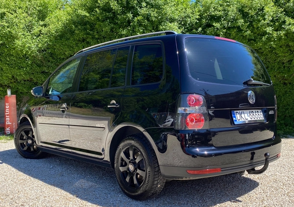 Volkswagen Touran cena 24900 przebieg: 248021, rok produkcji 2010 z Kłodzko małe 466